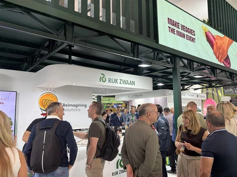 Visitors at the exhibitor stands